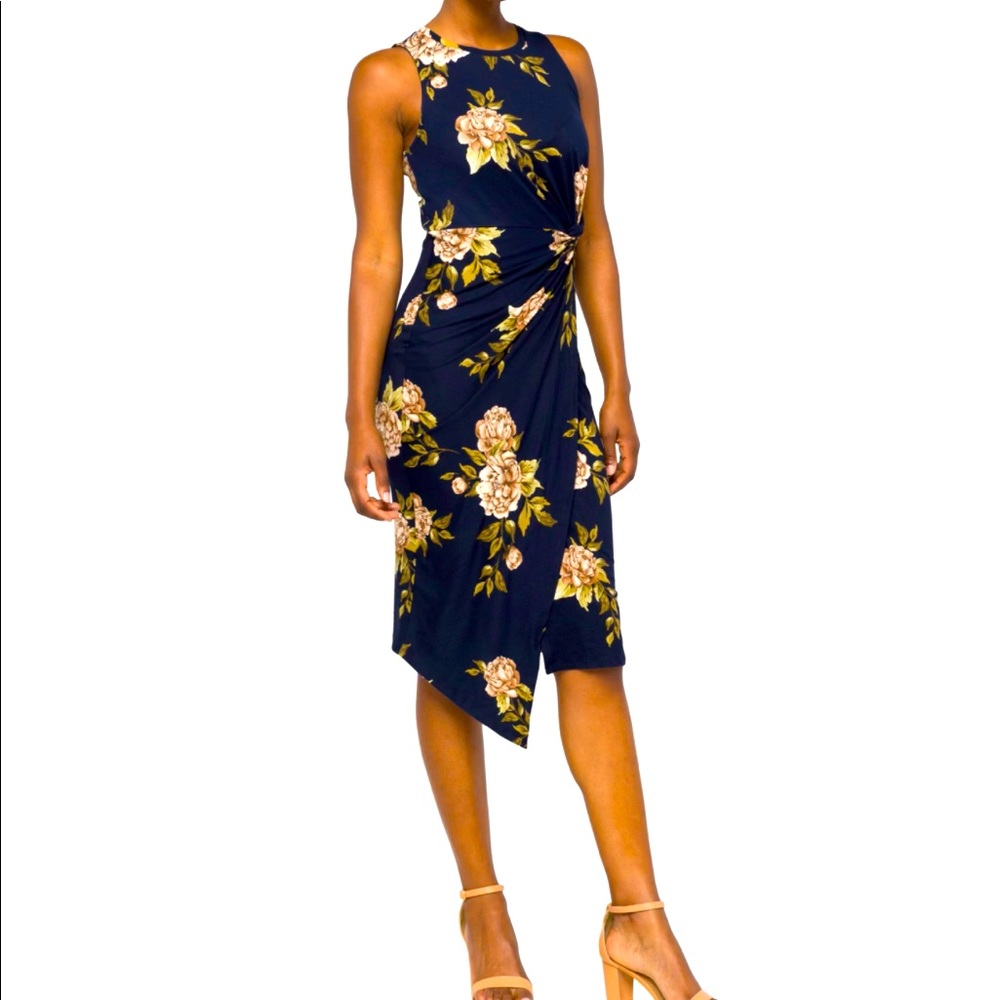 Sleeveless dress with front twist. Worn once.